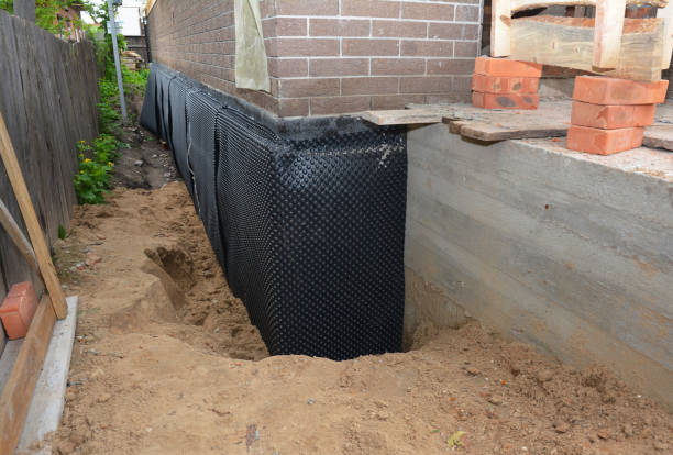 SJ Waterproofing Pros technician performing targeted Crawl Space Encapsulation assessment in Green Lake, WI
